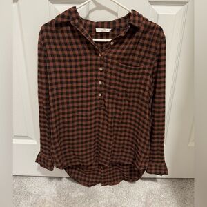 Burnt orange/black colored plaid shirt